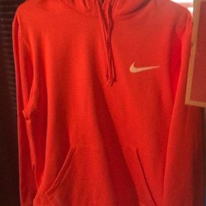 Bright orange Nike sweater